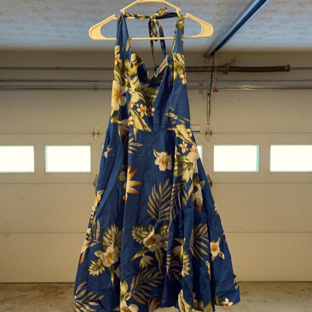 Blue twirly sundress. Floral, sweetheart neckline.